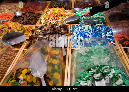 Market stall with scoops for pick and mix foam and jelly sweets Stock Photo