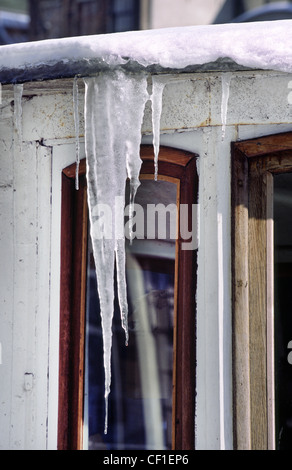 Ice taps on Houseboat. Amsterdam, The Netherlands. Stock Photo