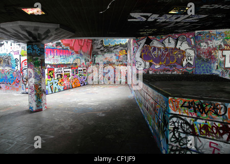 Graffiti covering the walls of the under-croft on the South Bank in London. Stock Photo