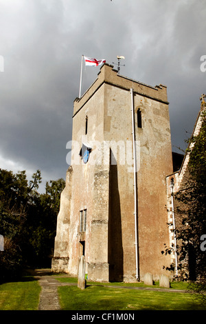 St Mary's Church Tower Selborne, Hampshire UK in strong sunlight from the churchyard Stock Photo