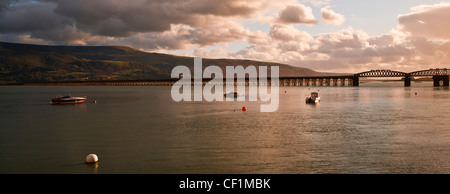 Panorama of the Barmouth Bridge, a single-track largely wooden railway viaduct that crosses the estuary of the Afon Mawddach. Stock Photo