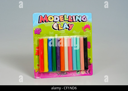 Coloured modelling clay in it’s original packaging, England, UK, Western Europe. Stock Photo