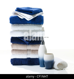 A still life shot of a stack of bathroom towels and accessories Stock Photo