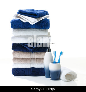 A still life shot of a stack of bathroom towels and accessories Stock Photo