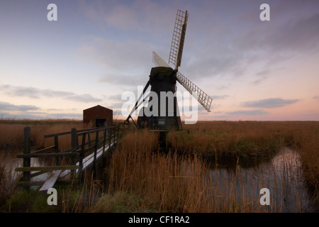 Herringfleet Mill or Walker's Mill, a restored, working smock mill on the Suffolk Broads (often generally referred to as the Nor Stock Photo