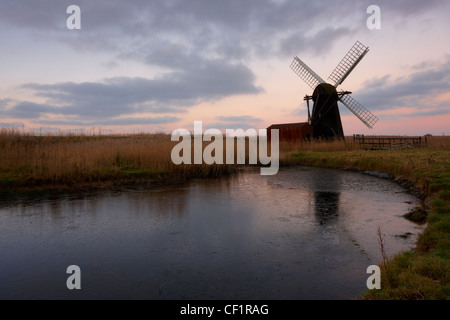 Herringfleet Mill or Walker's Mill, a restored, working smock mill on the Suffolk Broads (often generally referred to as the Nor Stock Photo