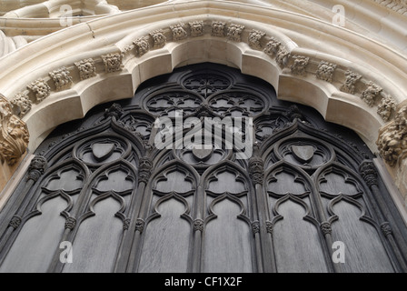 View looking up at architectural detail on the main entrance to the south transept of York Minster. Stock Photo