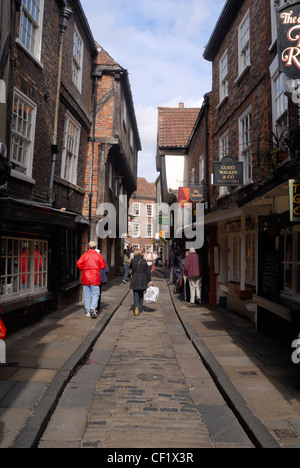 People walking along the Shambles in York. Stock Photo