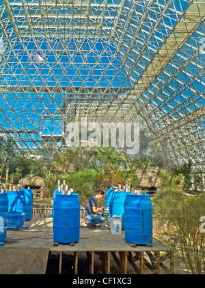 A scientist in the Landscape Evaluation Laboratory of Biosphere2 in the ...
