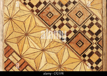 macro image of inlaid abstract geometric wood marquetry pattern Stock Photo