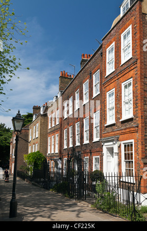 Elegant terraced houses in Church Row, Hampstead, one of the most complete Georgian streets in London. Stock Photo
