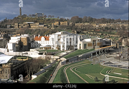 View of The Scottish Parliament and front lawn area with Calton Hill in Edinburgh Scotland Stock Photo