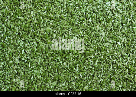 Background texture with fake grass in a public children playground, top view Stock Photo
