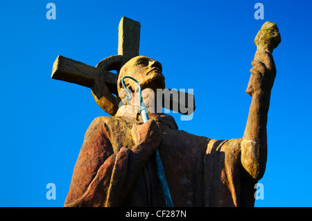 Statue of St Aidan in the grounds of the Lindisfarne Priory. Stock Photo