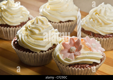 Closeup vanilla muffin with small candle Stock Photo
