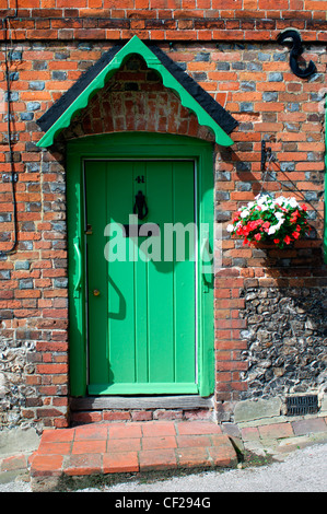 Traditional cottage front door in West Wycombe. West Wycombe village is owned by the National Trust. Stock Photo