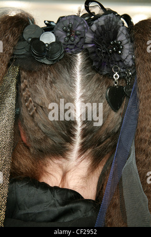 Luella BACKSTAGE London Ready to Wear Autumn Winter Close up female model back of head brunette cripped hair in bunches and Stock Photo