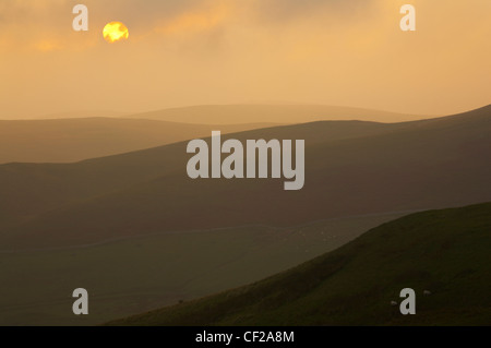 Northumberland National Park. Sunset over the rolling Cheviot Hills, viewed from the Border County Ride route near Murder Cleugh Stock Photo