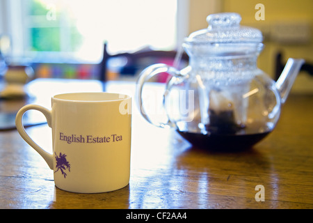 An English Estate tea mug on the table at Tregothnan Estate in South Cornwall. Stock Photo