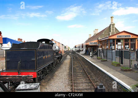A steam engine at Minehead Station, now the terminus and headquarters of the West Somerset Railway, a heritage railway. Stock Photo