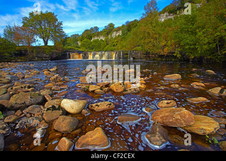 Autumnal view of Wain Wath Force, a waterfall on the River Swale in the Yorkshire Dales National Park. Stock Photo