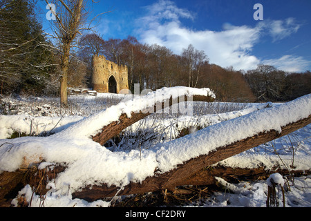 Snow covering the ground around the castle in Roundhay Park, one of the biggest city parks in Europe. The castle is a 19th centu Stock Photo