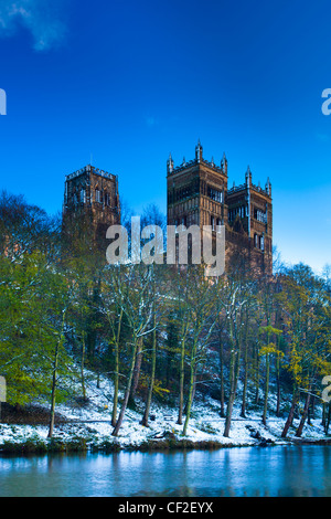 Durham Cathedral, situated above the snow covered river banks of the River Wear. Stock Photo
