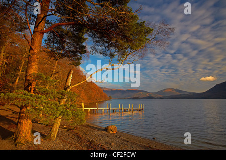 Autumnal view of Brandelhow Jetty on Derwentwater in the Lake District National Park. Stock Photo