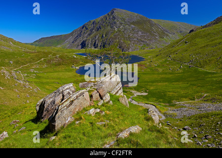 View of Pen Yr Ole Wen, the seventh highest mountain in Snowdonia and in Wales, from a path above Llyn Idwal in Snowdonia. Stock Photo