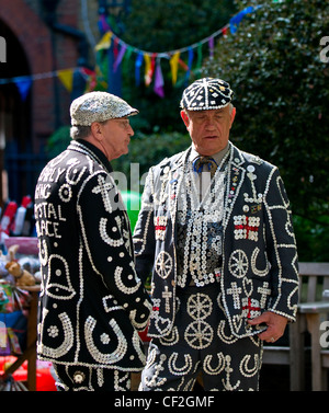The Pearly King of Highgate in conversation with the Pearly King of Crystal Palace. Stock Photo