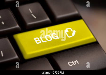 the yellow blog enter button key Stock Photo