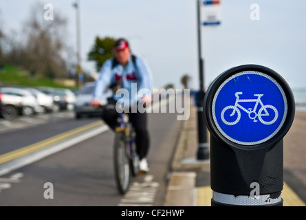 A sign indicating a cycle lane on the seafront at Southend-on-Sea. Stock Photo