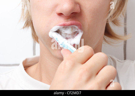 A person brushing his teeth Stock Photo
