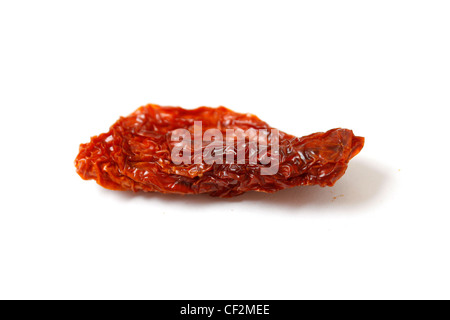 Dried tomatoes isolated on white Stock Photo