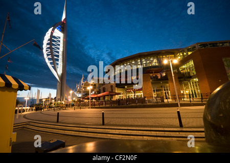 An early evening view of the 170m high Spinnaker Tower at Gunwharf Quays in Portsmouth Harbour. The tower offers breathtaking vi Stock Photo