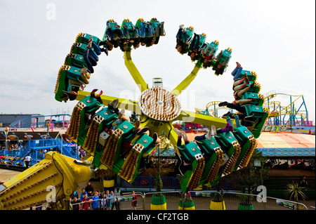 Dragon's Claw, a ride that spins people upside down at Adventure Island in Southend-on-Sea. Stock Photo