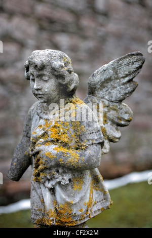 Cherub at St Marys Kirk, Auchindoir, one of Scotland's best preserved medieval parish kirks built circa 13th century. Stock Photo