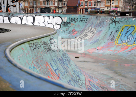 Graffiti on the walls of a bowl in a skatepark. Amsterdam, Netherlands. Stock Photo