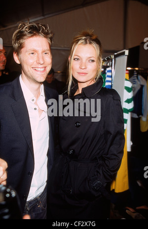 Backstage Milan Spring Summer Burberry Model Kate Moss and Burberry designer Chris Bailey standing closr together Kate Moss on Stock Photo