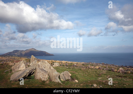 Giants Grave, chambered cairns from the Neolithic period in Glenashdale on the Isle of Arran. Holy Island in Lamlash Bay can be Stock Photo