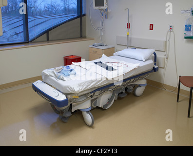 Hospital Bed In Empty Room Stock Photo