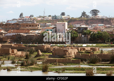 Rubbish and people on the banks of the Ikopa river outskirts of Antananarivo. Madagascar Stock Photo