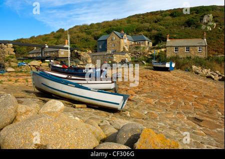 Fishing boats on the slipway in the small fishing cove of Penberth. Stock Photo