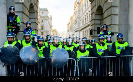Metropolitan police in riot gear at a student demonstration. Stock Photo