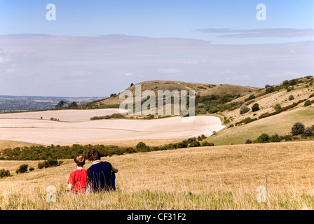 Chiltern Hills - on Pitstone Hill - woman and child enjoying view to Ivinghoe Beacon high summer day Stock Photo