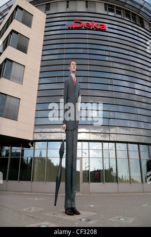 'The Tall Banker' sculpture outside the headquarters of the Deka Bank, Kirchberg Plateau, Luxembourg City, Luxembourg.