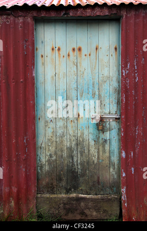 A decaying barn door near Talisker on the Isle of Skye. Stock Photo