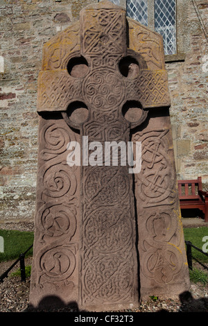 An Aberlemno sculptured stone in Aberlemno Kirkyard. The stone features a Celtic Cross in relief and a background of intertwined