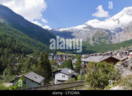 Alpine town of Saas Fee in Saas valley surrounded by high mountains, Vailais, Switzerland Stock Photo