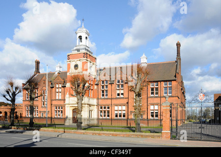 Brentwood School main brick building gates & front facadrd of private independent day & boarding school education with clock tower in Essex England UK Stock Photo